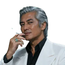 Character: the grey-haired man in a white suit, holding a cigarette